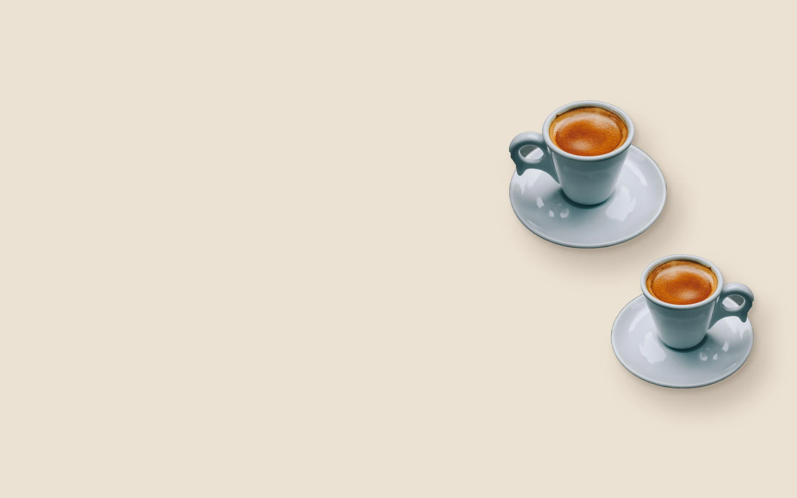 Two espresso cups on saucers